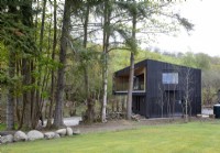 Exterior of contemporary home in woodland setting