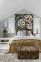 Bedroom with floral large painting