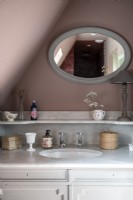 Vintage vanity unit and mirror in bathroom - detail 