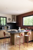 Contemporary red, black and wooden kitchen