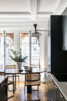 Decorative stained glass windows in modern kitchen-diner