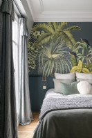 Tropical scene on feature wall in classic style bedroom