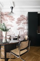 Decorative pink painted feature wall in modern kitchen diner 