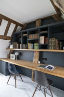 Built-in double desk unit in attic space