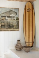 Detail of surfboard and painting 