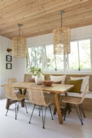 Scandinavian style dining room in wooden cabin