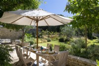 Outdoor dining area in country garden