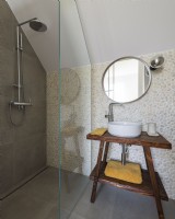 Small bathroom with shower in the attic