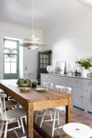 Large wooden dining table in country kitchen