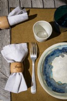 Detail of place setting on outdoor dining table