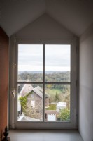 View of houses and countryside from upstairs window