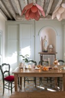 Eclectic dining room with panelled walls