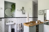 Modern monochrome bathroom with wooden vanity unit