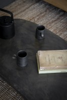 Detail of dark grey slate coffee table