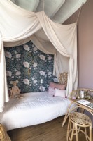 Childrens bed with floral feature wall and canopy 