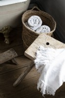 Bathroom towels in rustic basket