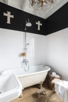 Freestanding bath in monochrome modern country bathroom