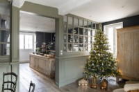 Christmas tree with view into kitchen