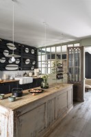 Modern country kitchen with distressed wooden island