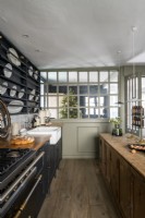 Modern country kitchen with internal glass wall 