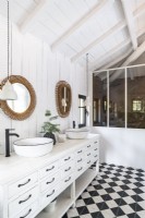 Twin sinks in monochrome country bathroom