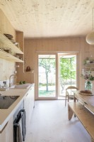 Wooden kitchen with garden views