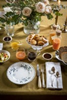 Detail of dining table laid for breakfast