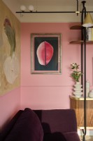 purple sofa in modern pink living room