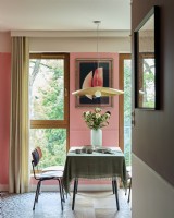 Pink dining room in modern apartment