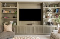 Bespoke bookcase storage solution in living room.