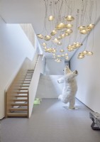 Polar bear sculpture in contemporary hallway