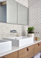 Modern double sink unit  with patterned tiled walls