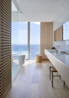 Contemporary bathroom with sea views