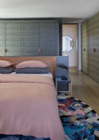 Pink and grey bedding in contemporary bedroom