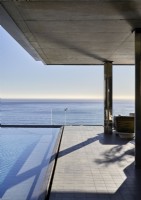 Swimming pool and sea views from contemporary terrace