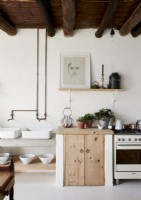 Country kitchen with exposed wooden beams 