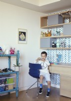 Young boy playing with toys