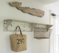Items that recall the coastal location are displayed together with a weathered shelf in one of the hallways.