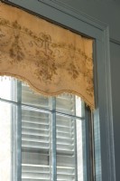 Renee fashioned a window scarf from a remnant of a vintage French fabric.