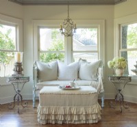 This little reading nook exemplifies Kathy's love of repurposing vintage finds and to draw on and even amplify the homeâ€™s cottage character. To highlight the humble, handmade character of the homeâ€™s furnishings and architecture, Kathy keeps pattern minimal. She prefers cotton and linen fabrics in their natural state. 