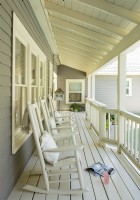 A series of classic slat-back rockers creates quintessential Texas porch style in an instant. Theyâ€™re also a great solution for furnishing narrow spaces.