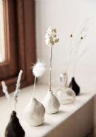 Ceramic vases with dried flowers