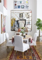 Large mirror on eclectic dining room wall 
