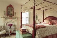 Over forty years after clipping an article about a red bed, Dawne purchased her very own. At its foot, sits a maple hope chest given to her by her father on her 16th birthday. An ornate Victorian fireplace surround complete the heritage look of the master bedroom.