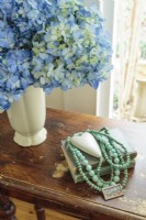 Even a cowgirl likes to indulge her feminine side may it be with flowers, poetry books or with jewelry, like these strings of turquoise beads.