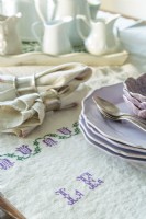 An embroidered hand- woven linen tablecloth sets the stage for
Sunday breakfast. 