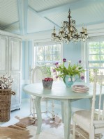 Beadboard brings a touch of farmhouse style to the  dining room.