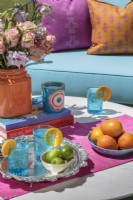 Jewel-toned serving ware borrows shades from nature to create an inviting tableau.