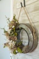 Inspired by nature, Charlie created wall art with a tin accent and dry flowers.