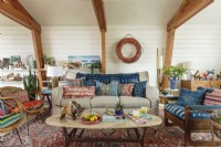  Assorted pillows and throws bring color and texture to the living room. 